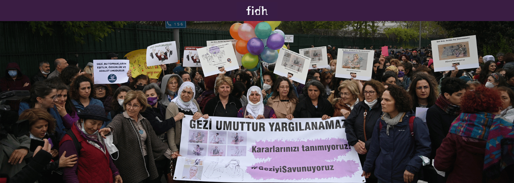 Protesters hold a banner reading "Gezi is hope, it can not be judged. We do not accept your judgments, We defend Gezi" in front of the Bakirkoy Women's prison in Istanbul on April 30, 2022. On April 25, 2022, the criminal court had delivered its judgment, sentencing Osman Kavala to aggravated life imprisonment and 7 others to 18 years of prison.